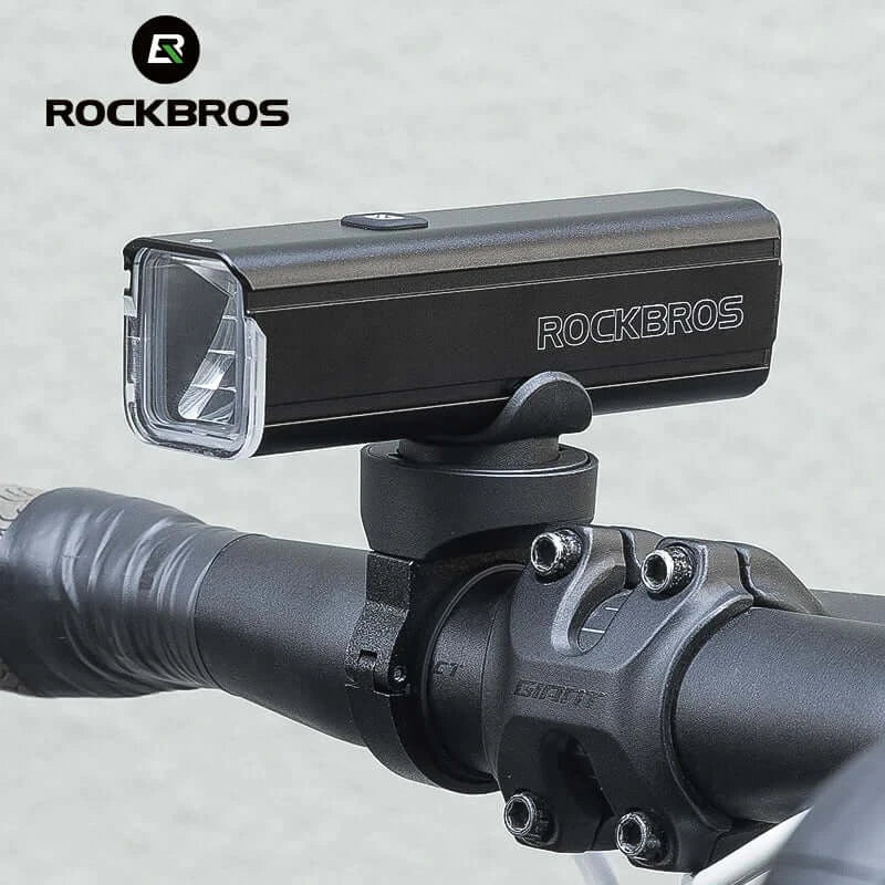 ROCKBROS 1000 Lumen Bike Light mounted on bicycle handlebars for enhanced night riding safety.