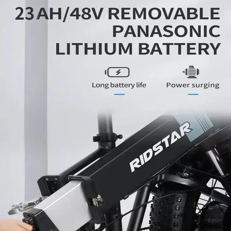 Close-up of 23AH/48V removable Panasonic lithium battery for electric mountain bike, highlighting long battery life features.
