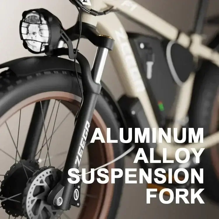 Close-up of aluminum alloy suspension fork on F1 electric bicycle with durable off-road tire.