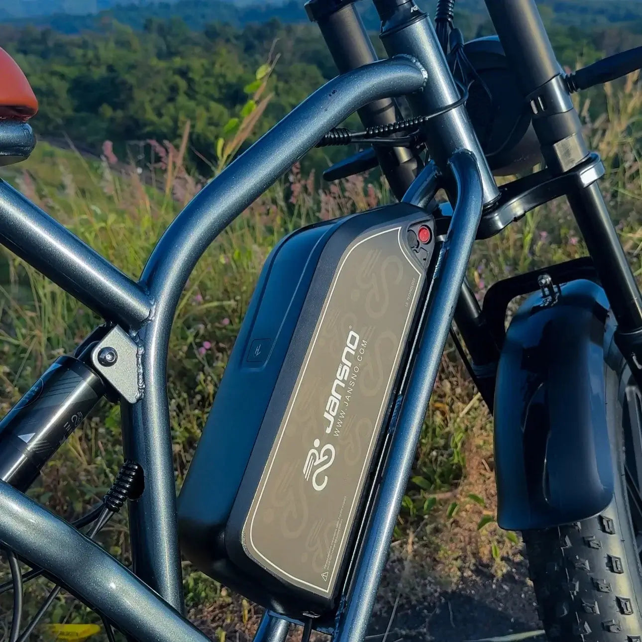 Jansno X50 Electric Bike 750W motor battery view on all-terrain bike, showcasing robust design for adventure.